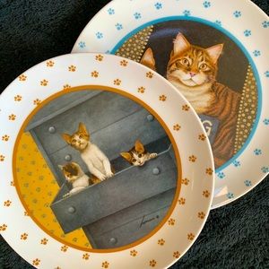 Two porcelain plates with cat art